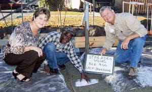 Dee Danmeyer, president and CEO of Habitat for Humanity of Greater Orlando; Terry Eckert, director of construction for Habitat for Humanity of Greater Orlando; and future Habitat homeowner Gary.