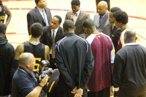 Coach Craig has a word with his team. KARSCEAL TURNER-WONO