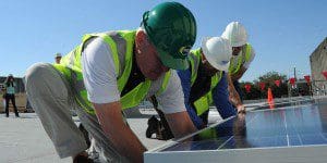 Orlando Mayor Buddy Dyer works along with OUC
