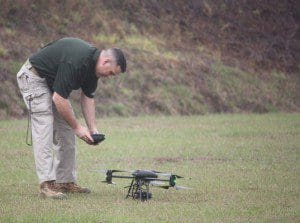 An OCSO officer operates the Dragonflyer X6 at the OCSO Range, 14500 Wewahootee Road, Orlando, January 18, 2013. (Photo: WONO)