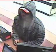 Surveillance video of suspected armed robber of Bravo Supermarket