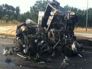 Photo courtesy - PCSO - Car in foreground (east bound lane) and the tractor. The trailer extends into west bound lanes.