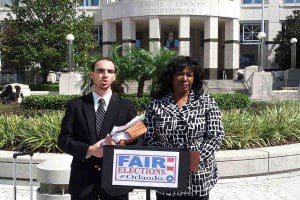 Former municipal candidates Mike Cantone and Lawanna Gelzer call for a criminal investigation into the 2012 Orlando municipal election at a news conference, February 27, 2013. (Photo: WONO)