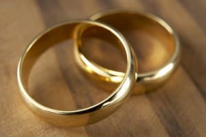two-wedding-rings-resting-together