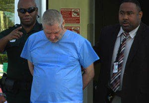 Lawrence Williams (c) - suspect - escorted by two Orange County Sheriff's Office detectives (Photo: OCSO)
