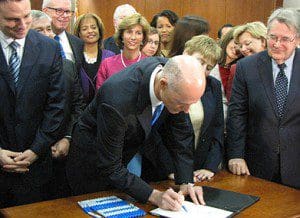 Gov. Rick Scott signs sweeping education reform bill at a ceremony on Monday, April 22, 2013 (Photo credit: Brandon Larrabee)