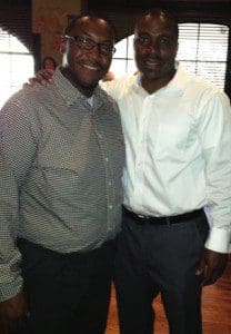 Dr. Phillips High School Panther Head Coach Rodney Wells (r) and Coach Jason Jackson share a light moment at the DP Panthers Booster's dinner, May 4, 2013 (Photo: WONO)