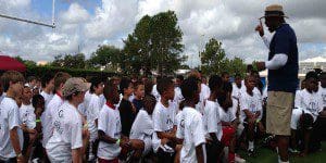 DP Head Coach Rodney Wells gives a pep talk, as he kicks off the 2013 Dr. Phillips Panther Youth Football Combine, at Bill Spoone Stadium, June 1, 2013. (Photo: WONO)