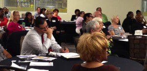 Participants at Orlando Mayor Buddy Dyer's Summit on Senior Hunger, listen attentively to presenters, Second Harvest Food Bank of Central Florida, Orlando, June 11, 2013. (Photo: WONO)