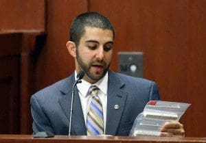 Florida Department of Law Enforcement Crime Lab Analyst Anthony Gorgone looks at DNA samples that he previously examined during the George Zimmerman trial in Seminole circuit court. (Jacob Langston, Pool/Orlando Sentinel)
