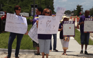 Healthcare workers and 1199 SEUI members picket outside