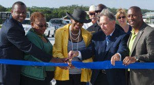 l-r: Rep. Randolph Bracy, Sen. Geraldine Thompson, Orlando City Commissioner Daisy Lynum, Alan Hyman FDOT Director of Operations D5, Eatonville Town Councilman Alvin Moore, cut the ribbon to unveil John Young Parkway/SR 423 Extension, September 19, 2013.