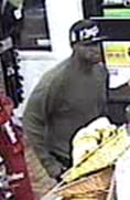 Video still of armed robbery suspect