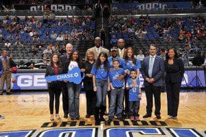 As part of NBA Cares Season of Giving, the Orlando Magic and Chase celebrated Christmas in a BIG way surprising Army vet Juan Velasquez and his family during the Magic vs. Knicks matchup on December 23. Photo credit: Gary Bassing.