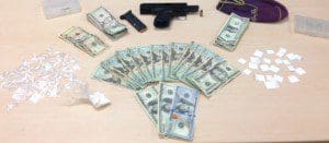 Crack cocaine, powdered cocaine, cash and 9mm seized.