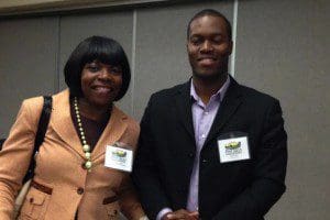 Roberta Walton, candidate for Orange County Commission, District 6, poses with a business owner at the Pine Hills Business Association event, February 18, 2014. (Photo: WONO)