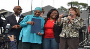 r-l: Mayor Teresa Jacobs, Orange County Commissioner, District 6, Tiffany Moore Russell and N.Y. Nathiri, Director of Multidisciplinary Programs, P.E.C., 2014 Zora Festival. (Photo credit: Orange County Government)