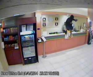 Video still - Comforts Suites armed robber (OPD)