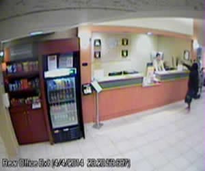 Video still of armed Comfort Suites robber (OPD)